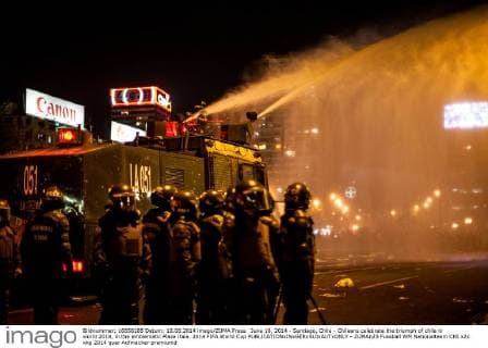 FIFA World Cup 2014, Riots in Santiago de Chile: Fans celebrate World Cup victory against Spain