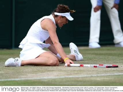 Tennis, Wimbledon, Andrea Petkovic continues despite back problems