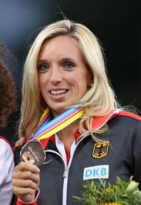 Athletics, European Championships in Zurich, 100m hurdles, Cindy Roleder at the award ceremony