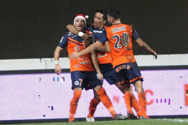 Football, France, Ligue 1, Montpellier's Anthony Mounier cheers after goal in Christmas hat