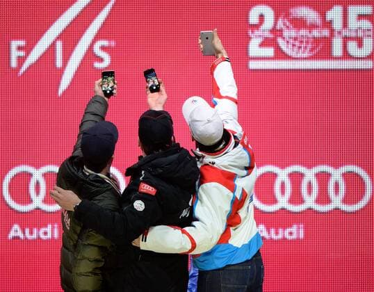 Alpine skiing, World Cup, Award ceremony Super-G, Cook, Reichelt and Theaux take a selfie on the podium