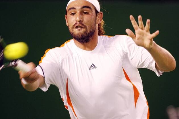 Tennis, Australian Open, semi-finals, Marcos Baghdatis wins against David Nalbandian