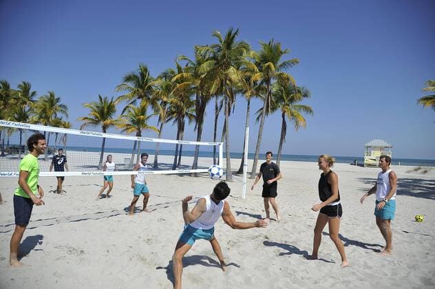 Tennis players playing football tennis in Key Biscayne