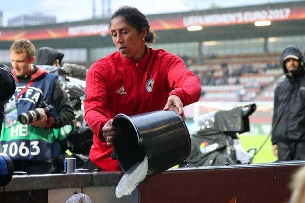 Football, Women's EURO, Germany - Denmark, Steffi Jones fights against the water masses
