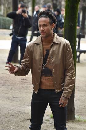 Neymar attends Louis Vuitton fashion show in Paris