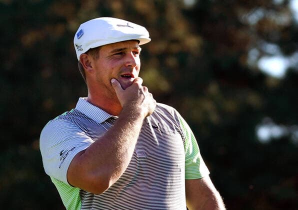 Golf, Bryson DeChambeau hits ball 340 yards over lake - stock images