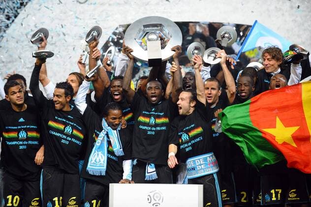 Football, France, Ligue 1, Olympique Marseille celebrate winning the championship