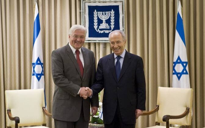 Israeli President Shimon Peres (R) shakes hands with German Foreign Minister Frank-Walter Steinmeier during a meeting at the president s residence in Jerusalem on July 6, 2009. (UPI Photo Jonathan Nackstrand Pool)  WAX20090706301