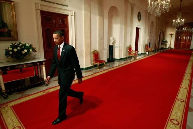 President Barack Obama walks into the East Room for his fourth prime time televised news conference at the White House in Washington on July 22, 2009. Obama used the news conference to push his and Congress plan to overhaul the American health care system. (UPI Photo Chip Somodevilla Pool) U.S. President Obama speaks at press conference in Washington  WAX200907223307