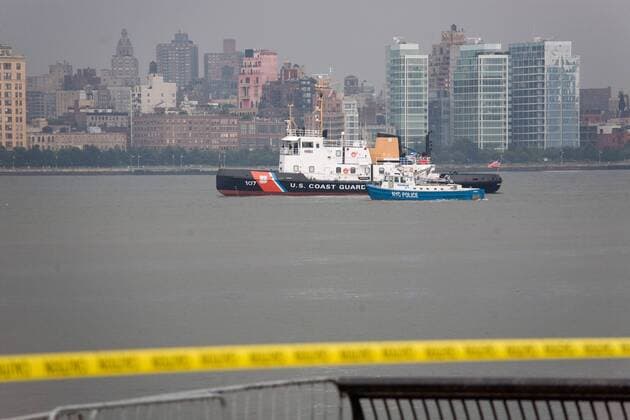 Police and coast guard personnel continued to search for missing bodies and debris in the Hudson River as seen from Hoboken, New Jersey Sunday, August 9, 2009. Four of the nine bodies were retrieved from the river Sunday, following the midair collision between a tourist helicopter and small plane over the river the day before. The wreckage of the helicopter was also retrieved. UPI Nicole Tung. Investigators continue to look for bodies and wreckage from the Hudson River following Saturday s collision between a tourist helicopter and a small plane in New York  NYP2009080904