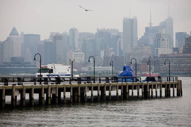 Police and coast guard personnel continued to search for missing bodies and debris in the Hudson River as seen from Hoboken, New Jersey, August 9, 2009. Four of the nine bodies were retrieved from the river Sunday, following the midair collision between a tourist helicopter and small plane over the river the day before. The wreckage of the helicopter was also retrieved. UPI Nicole Tung. Investigators continue to look for bodies and wreckage from the Hudson River following Saturday s collision between a tourist helicopter and a small plane in New York  NYP2009080906