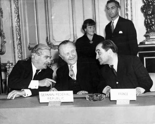 Oct 03, 1954; London, UK; Bristish Mr. ANTHONY EDEN, West German Chancellor Dr. KONRAD ADENAUER and Mr. MENDES FRANCE, the French Premier, signing at Lancaster House in London. London UK  - ZUMAk09