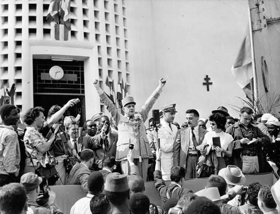 Aug 28, 1958; Paris, France; General CHARLES DE GAULLE standing in front of De Gaulle s House acknowledges the cheers of the crowds at Brazzaville, Equatorial Africa. The General is making the V gesture. Paris France  - ZUMAk09