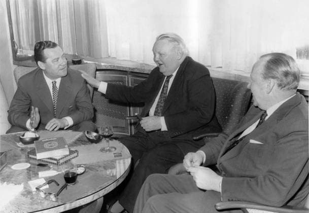 Jan 01, 1960 - Nuremberg, France - As Germany s minister of economic affairs from 1949 to 1963, LUDWIG ERHARD crafted the plan for West Germany s post-World War II economic recovery, sometimes called the German economic miracle. In 1957 he was named vice chancellor, and in 1963 he succeeded Konrad Adenauer as chancellor. In late 1966, Erhard s government fell after the four Free Democratic party ministers in his cabinet resigned and left him without a ruling majority in the federal parliament. PICTURED: German businessman MAX GRUNDIG, LUDWIG ERHARD and Grundig CEO OTTO SIEWEK in the Grundig factory. Nuremberg France  - ZUMAk09