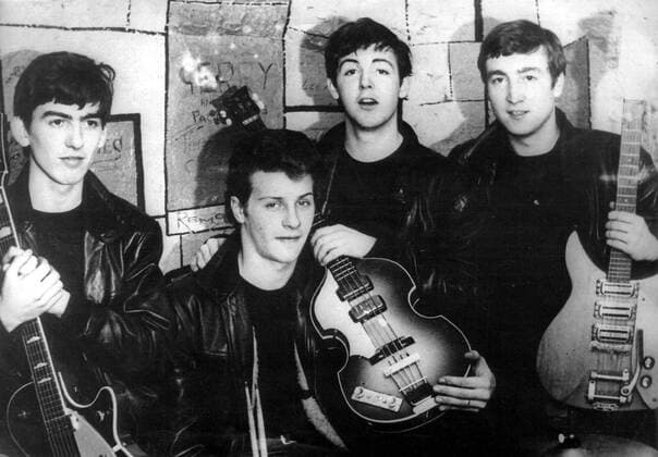 Liverpool, UK - THE BEATLES in the original cast, GEORGE HARRISON, PETE BEST, PAUL MCCARTNEY, JOHN LENNON pictured during a concert in Cavern Club, Liverpool. One of the most commercially successful and critically acclaimed bands in the history of popular music, the Beatles led the mid-1960s musical British Invasion into the United States. Landing on these shores on February 7, 1964, they literally stood the world of pop culture on its head, setting the musical agenda for the remainder of the decade. Liverpool UK  - ZUMAk09