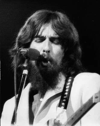 Concert for Bangladesh, New York - GEORGE HARRISON (25 February 1943 29 November 2001) was an Academy Award and Grammy Award-winning English rock guitarist, singer, songwriter, author and sitarist best known as the lead guitarist of The Beatles. Following the band s demise, Harrison had a successful career as a solo artist and was also a film producer, with his production company Handmade Films, involving people as diverse as Madonna and the members of Monty Python. From an initial exposure whilst a member of The Beatles, he maintained a high public profile regarding his religious and spiritual life London UK  - ZUMAk09