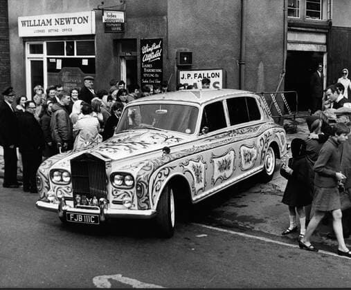 May 26, 1967; London, UK; Singer JOHN LENNON member of The Beatles took delivery of his re-decorated Rolls Royce, it has been painted yellow, with signs of the zodiac and flowers. London UK  - ZUMAk09