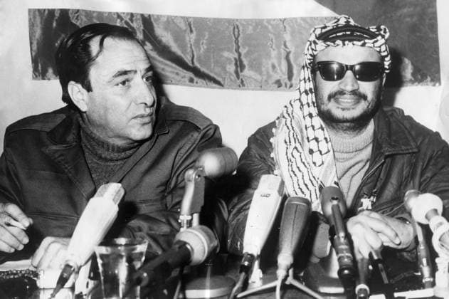 Mar 02, 1970 - Amman, Jordan - For decades YASSER ARAFAT has been the leader and figurehead of the Palestinian people s struggle for statehood. He was Chairman of the Palestine Liberation Organization, President of the Palestinian National Authority, and leader of the secular Fatah political party, which he founded 1959. Arafat spent much of his life fighting against Israel in the name of Palestinian self-determination. Originally opposed to Israel s existence, he modified his position in 1988 when he accepted UN Security Council Resolution 242. PICTURED: YASSER ARAFAT (right) and Palestinian activist KAMAL NASSER during a press conference pf he Palestine Liberation Organization. Amman Jordan  - ZUMAk09