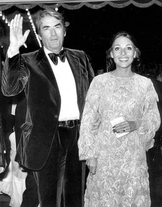 Jul 05, 1973 - London, England, UK - An Oscar-winning American film actor GREGORY PECK and his wife VERONIQUE PASSANI during the opening night of the Bond movie Live and Let Die in London. One of the postwar era s most successful actors, GREGORY PECK was long the moral conscience of the silver screen; almost without exception, his performances embodied the virtues of strength, conviction, and intelligence so highly valued by American audiences. As the studios iron grip on Hollywood began to loosen, he also emerged among the very first stars to declare his creative independence, working almost solely in movies of his own choosing. London UK  - ZUMAk09