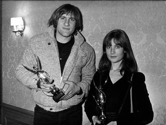 Jun 01, 1979 - Paris, France - (File Photo: c1979, location unknown) GERARD DEPARDIEU (Gerard Xavier Marcel Depardieu) is an Academy Award-nominated French actor. He was twice awarded a Cesar as Best Actor, for Le Dernier metro (1980), and Cyrano de Bergerac (1990), received also an Oscar nomination for Cyrano de Bergerac. PICTURED: GERARD DEPARDIEU, left, and ISABELLE HUPPERT with Best Actor awards. Paris France  - ZUMAk09