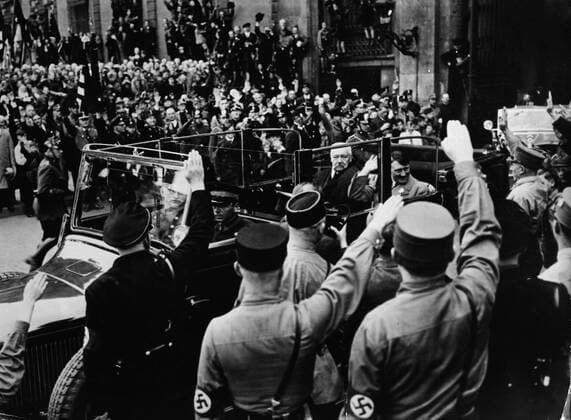 May 01, 1933; Berlin, GERMANY; German Reich President PAUL VON HINDENBURG and Nazi leader ADOLF HITLER are saluted by a crowd during the celebrations of the May Day in Germany. Berlin GERMANY  - ZUMAk09