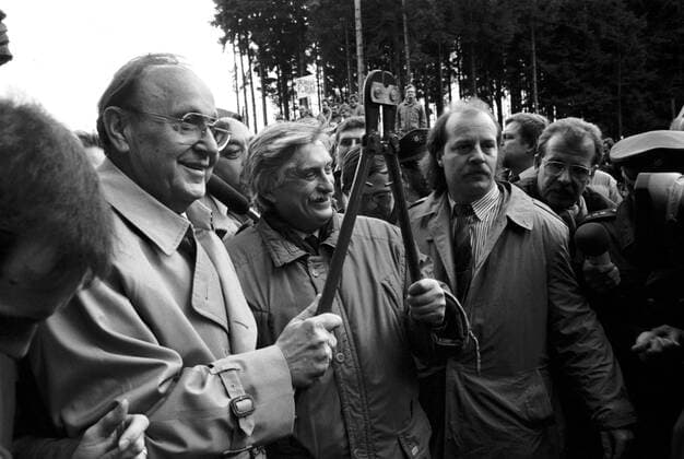 FILE - In this December 23, 1989 file photo ministers of Foreign Affairs Hans-Dietrich Genscher of Germany (left) and Jiri Diensbier of Czechoslovakia prior to the symbolic cutting of barbed wire in the border zone at Nove Domky near Rozvadov, December 23,1989. CTK Photo Jiri Berger 