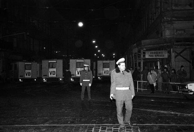 Velvet Revolution. Police at Narodni trida in Prague, Czechoslovakia, on November 17, 1989. The events of November 1989 started by brutally supressed student demonstration led to government fall and the end of Communist regime in Czechoslovakia. Policeman walks toward the protestors.CTK Photo Pavel Hroch) 