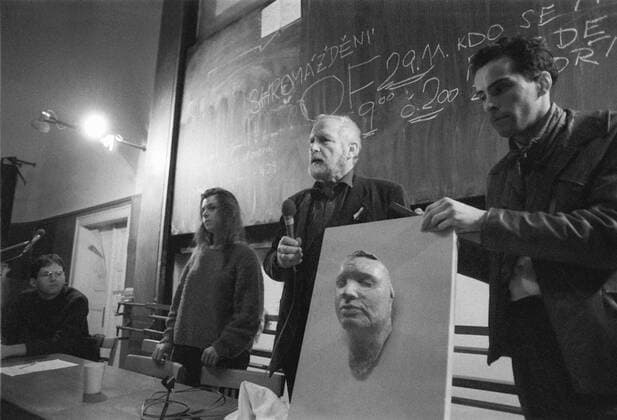 Prague during 1989 Velvet Revolution, sculptor Olbram Zoubek (C) holds a post mortem cast of Jan Opletal s head, student killed by German invaders in 1939. CTK Photo Pavel Hroch 