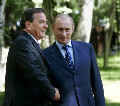 KALININGRAD REGION, RUSSIA. JULY 3. German Chancellor Gerhard SchrÃ¶der (L) and President Vladimir Putin shake hands at their meeting in the town of Svetlogorsk, Russia s Kaliningrad Region.  TASS_166216