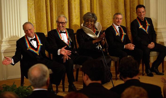 U.S. President Barack Obama (not seen) hosts the 2009 Kennedy Center Honorees at an East Room reception in the White House in Washington on December 6, 2009. On stage are (L to R) honorees Mel Brooks, Dave Brubeck, Grace Bumbry, Robert DeNiro, and Bruce Springsteen.  WAX20091206710
