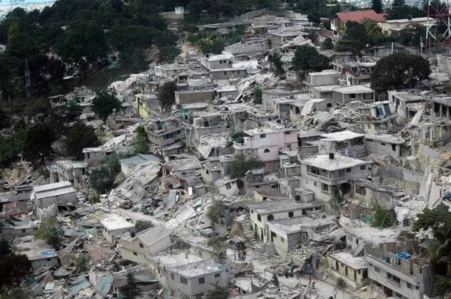 Haiti s capital Port-au-Prince is seen from an aerial assessment mission by the American Red Cross on January 13, 2010. Officials fear that hundreds of thousands may have perished in the January 12 quake, but no casualty reports are confirmed.  WAX20100114703