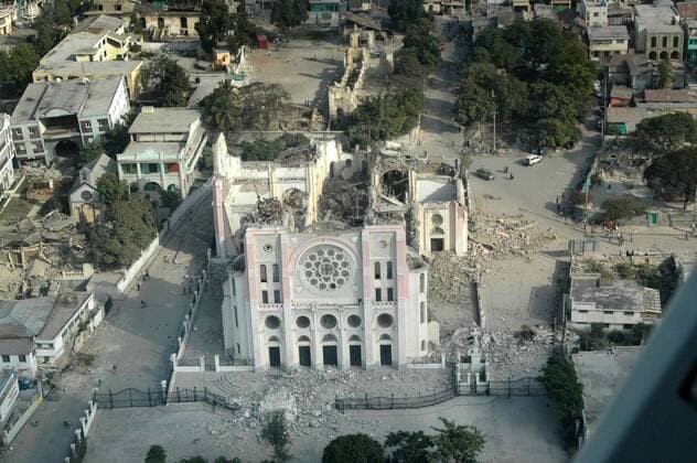 Haiti s capital Port-au-Prince is seen from an aerial assessment mission by the American Red Cross on January 13, 2010. Officials fear that hundreds of thousands may have perished in the January 12 quake, but no casualty reports are confirmed.  WAX20100114710