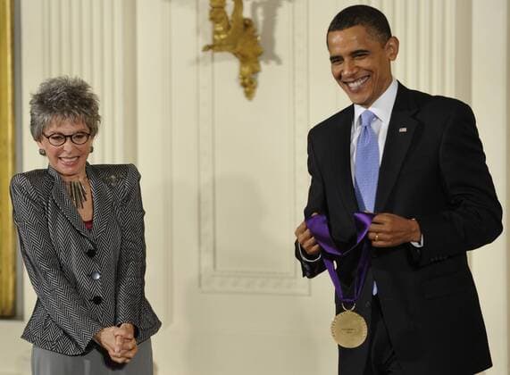 U.S. President Barack Obama and Rita Moreno smile before he awards her the 2009 National Arts Medal during a ceremony in the East Room of the White House in Washington on February 25, 2010. Moreno, a Puerto Rican singer, dancer and actress, is the first and only Hispanic and one of ten performers who have won an Emmy, a Grammy, an Oscar, and a Tony.  WAP20100225524