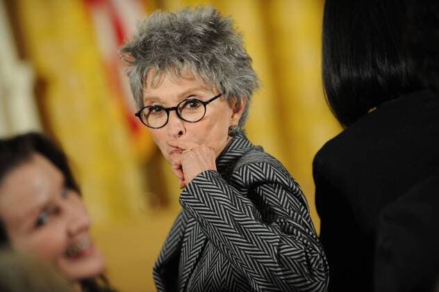 Rita Moreno attends a ceremony to receive the 2009 National Arts Medal in the East Room of the White House in Washington on February 25, 2010. Moreno, a Puerto Rican singer, dancer and actress, is the first and only Hispanic and one of ten performers who have won an Emmy, a Grammy, an Oscar, and a Tony.  WAX20100225733