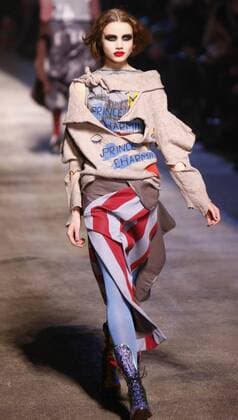 (100306) -- PARIS, March 6, 2010 (Xinhua) -- A model presents a creation by British designer Vivienne Westwood during the autumn-winter 2010 2011 ready-to-wear collection show in Paris, capital of France, on March 5, 2010. (Xinhua Zhang Yuwei) (lr) (5)FRANCE-PARIS-VIVIENNE WESTWOOD-FASHION SHOW 