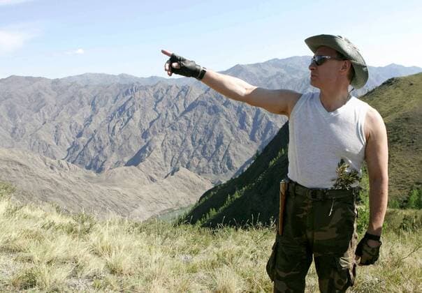 ITAR-TASS 19: TUVA REPUBLIC, RUSSIA. AUGUST 15. Russian President Vladimir Putin walking in the Western (Zapadny) Sayan Mountains.  TASS_501747