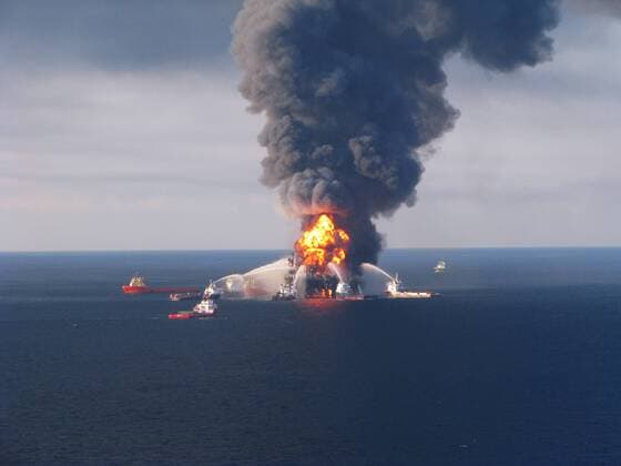 Fire boat response crews battle the blazing remnants of off shore oil rig Deepwater Horizon off the coast of New Orleans, Louisiana on April 21, 2010. 11 workers are missing after the oil rig exploded on April 20.  WAX20100422714