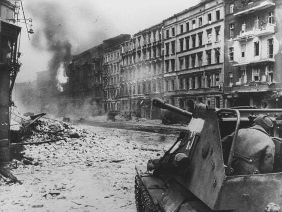 Soviet soldiers take part in street combats in Berlin. April of 1945. Reproduction.  TASS_266180