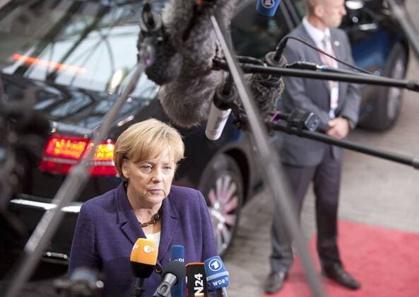(100507) -- BRUSSELS, May 7, 2010 (Xinhua) -- German Chancellor Angela Merkel speaks to reporters upon her arrival for a special EU summit in the Justus Lipsius, the headquarters of the European Council in Brussels, capital of Belgium, May 7, 2010. Eurozone leaders get together on Friday for a special summit to conclude the aid process for debt-ridden Greece. (Xinhua Thierry Monasse) (lx) (14)BELGIUM-BRUSSELS-EU SUMMIT 