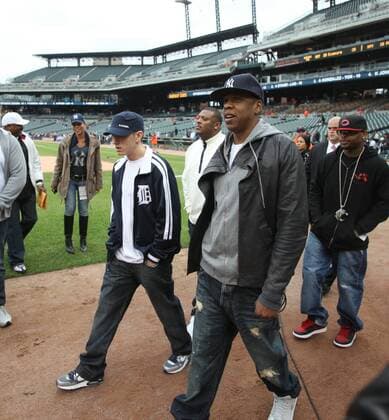 May 12, 2010 - Detroit, Michigan, U.S. - Eminem (L) and Jay-Z walk onto the field to meet some of the Detroit Tigers at the dugout steps before the Tigers second game of their double header against the New York Yankees in Detroit MI on Wednesday, May 12, 2010. - ZUMAf31