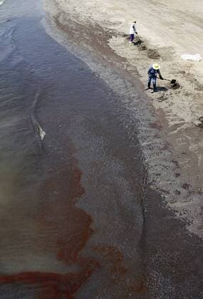 Crude oil washes up on the beach of Grand Isle State Park in Louisiana June 9, 2010. Oil has been leaking into the Gulf of Mexico for over a month since a massive explosion on the BP oil rig Deepwater Horizon.  NOP2010060912