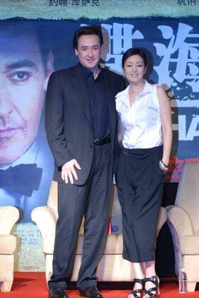 SHANGHAI, CHINA-JUNE 13:(CHINA OUT) American film actor and screenwriter John Cusack and Chinese actress Gong Li attend a press conference of film - Shanghai - during the 13th Shanghai International Film Festival on June 13, 2010 in Shanghai, China.  CFP407822502