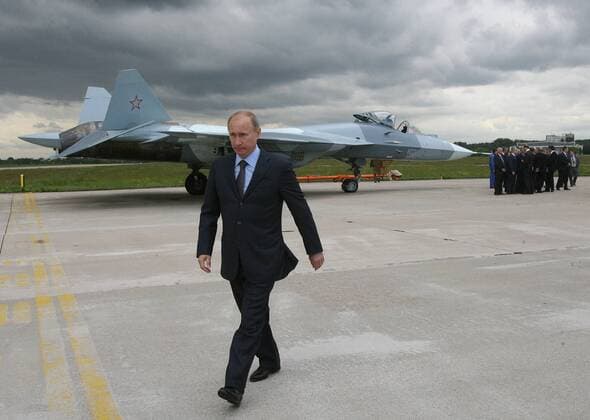 ITAR-TASS: MOSCOW REGION, RUSSIA. JUNE 17, 2010. Russia s prime minister Vladimir Putin visits the Gromov Airfield in Zhukovsky, some 13 miles south-east of Moscow, where Russia s new stealth fighter jet, Sukhoi T-50, is being tested.  Highlight RE0D1F5B