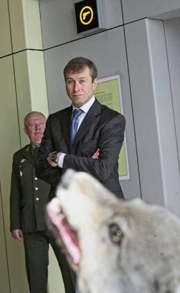 ITAR-TASS 38: ANADYR, CHUKOTKA, RUSSIA. APRIL 3. Governor of Chukotka Roman Abramovich, foreground, looks at a wolf s head on display at the Chukotka Heritage Museum Centre in Anadyr.  Highlight 456099