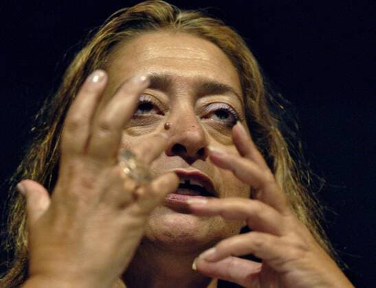 ITAR-TASS 12: MOSCOW, RUSSIA. JUNE 11. Prominent Iraqi-born architect Zaha Hadid gestures as she speaks during a meeting with her colleague, Daniel Libeskind, the author of a plan for rebuilding the World Trade Center, at the 10th ARCH Moscow international architecture and design exhibition in the Central House of Artist.  162143