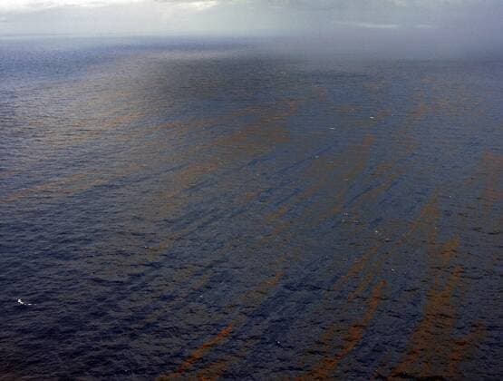 Oil creates a pattern in the water of the Gulf of Mexico, July 3, 2010 near the BP Deepwater Horizon accident site. BP continues its attempts to stem the flow of oil from its rig, which exploded and sank in the Gulf in April.  NOP2010070302