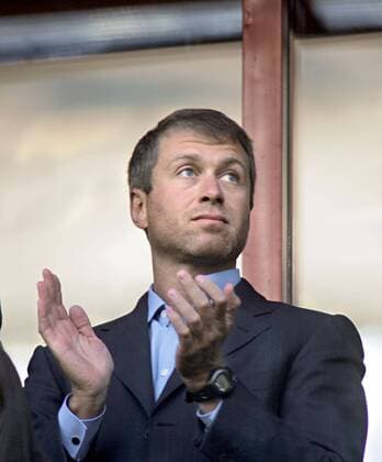 ITAR-TASS 01: MOSCOW, RUSSIA. SEPTEMBER 8. Chukotka s Governor Roman Abramovich watches qualifying match of World Championship 2006, Russia vs.Portugal from a grandstand. The game ended in a draw, 0-0.  177505