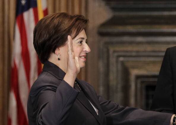 Elena Kagan takes the oath of office as the Supreme Court s newest member, administered by Chief Justice John Roberts (not shown) sworn in as the Supreme Court s newest member at the Supreme Court Building in Washington on August 7, 2010. Kagan, 50, who replaces retired Justice John Paul Stevens, becomes the fourth woman to sit on the high court and is the first Supreme Court justice in nearly four decades with no previous experience as a judge.  WAX20100807709