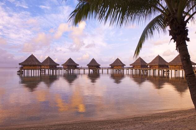 French Polynesia, Rangiroa. Sunset at the the Kia Ora Resort. -