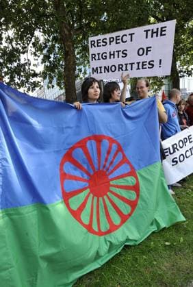 (100904) -- BRUSSELS, Sept. 4, 2010 (Xinhua) -- Protestors wave a Romani Flag during a demonstration against Roma expulsion made by French government in front of French Embassy in Brussels, capital of Belgium, Sept. 4, 2010. Demonstrations occurred in main European cities Saturday to protest France s Roma deportations. (Xinhua Wu Wei) BELGIUM-BRUSSELS-ROMA-PROTEST 